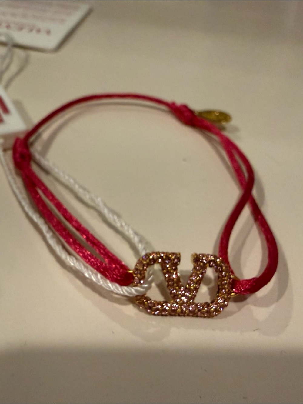 Valentino Pink and White Crystal V-Logo Cord Bracelet